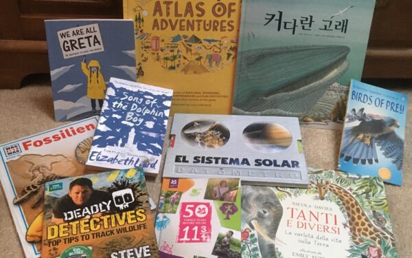 A selection of books about nature, in multiple languages